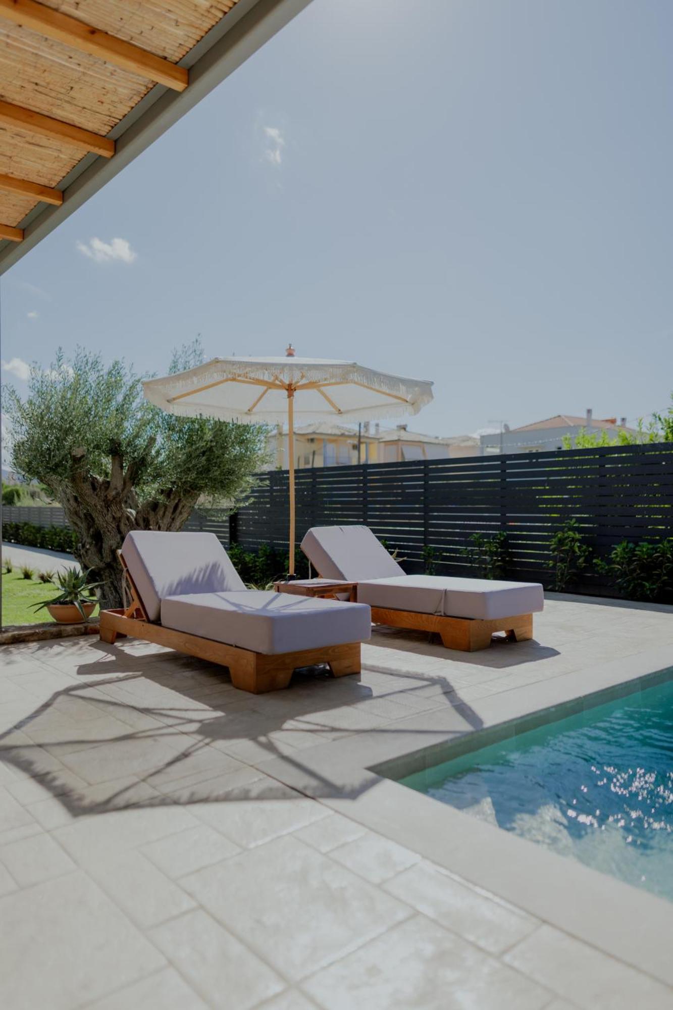 Niama Luxury Apartments نافبليو المظهر الخارجي الصورة