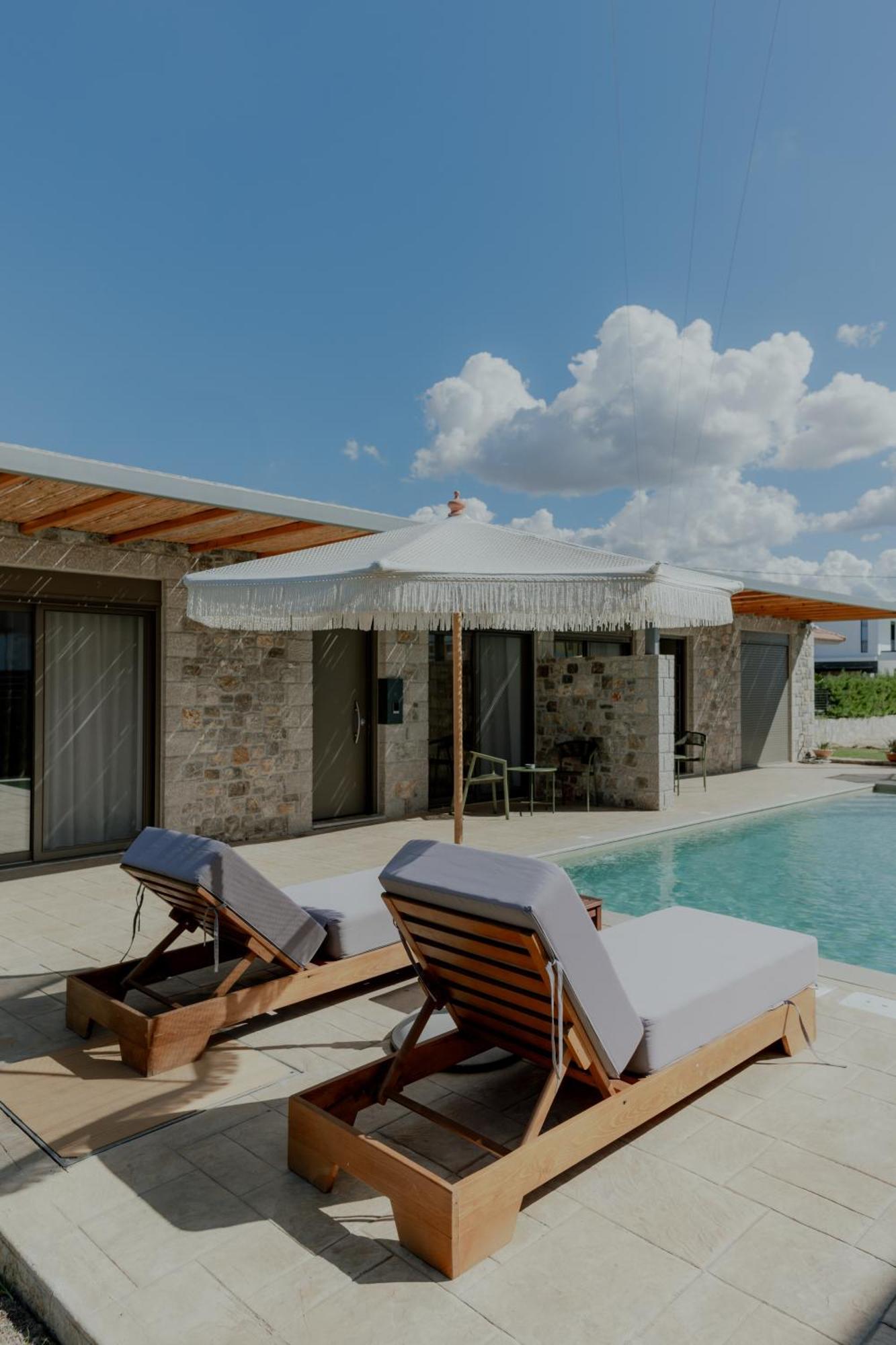 Niama Luxury Apartments نافبليو المظهر الخارجي الصورة