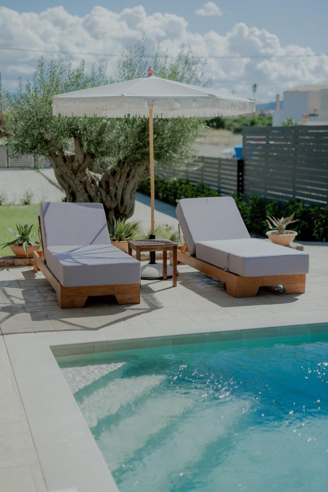 Niama Luxury Apartments نافبليو المظهر الخارجي الصورة
