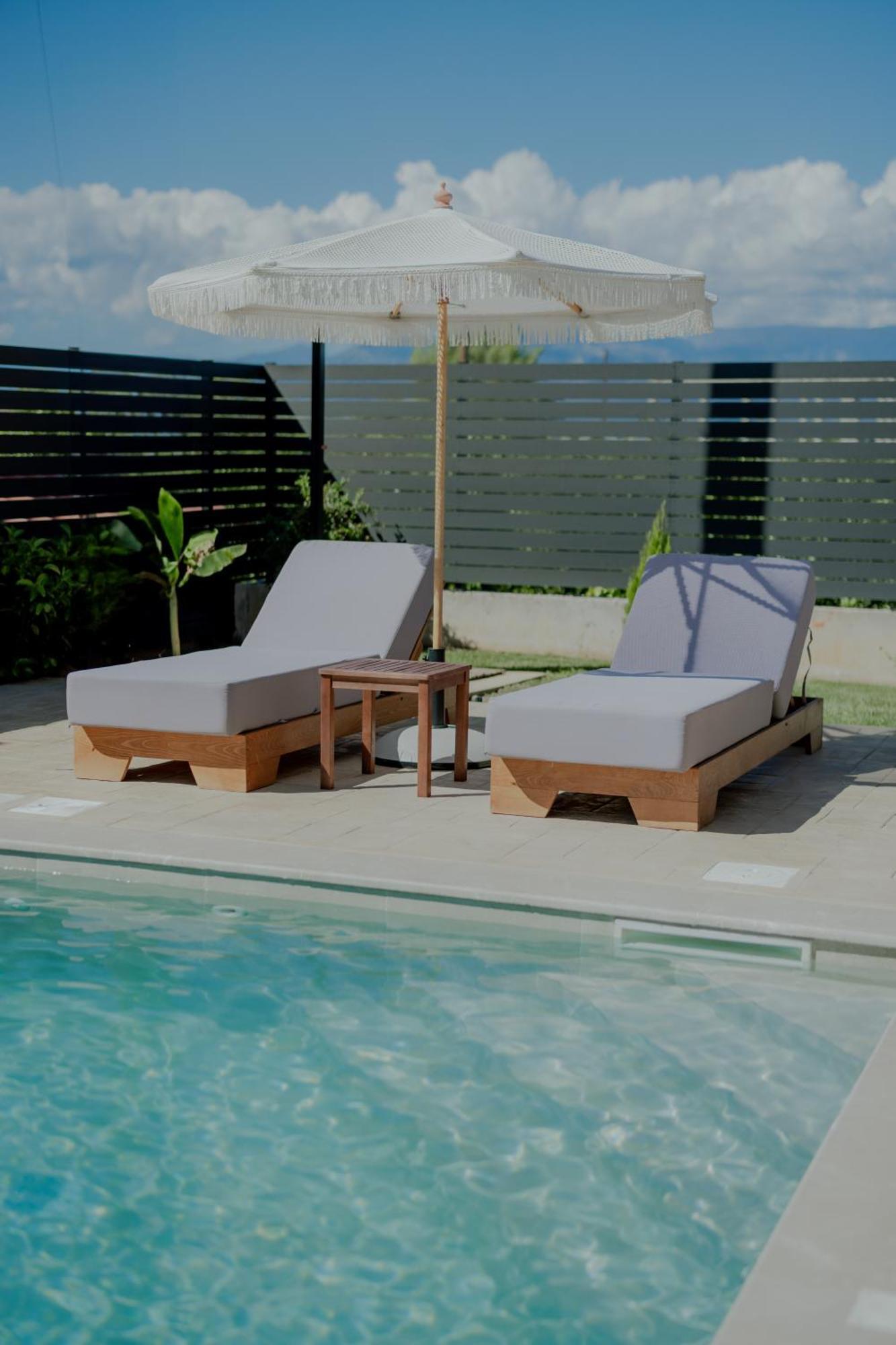Niama Luxury Apartments نافبليو المظهر الخارجي الصورة